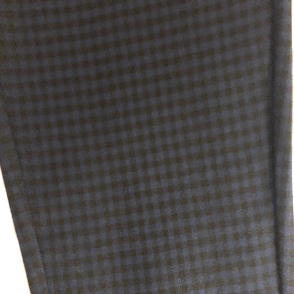 Dark blue and black checked pants.